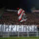 Tifosi del Milan nel settore ospiti del Dall’Ara a Bologna con lo striscione “Solo per la maglia”.