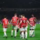 Giocatori del Milan esultano insieme a San Siro dopo aver segnato un gol contro l’Inter durante il derby di Coppa Italia