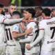 Giocatori del Milan esultano dopo un gol